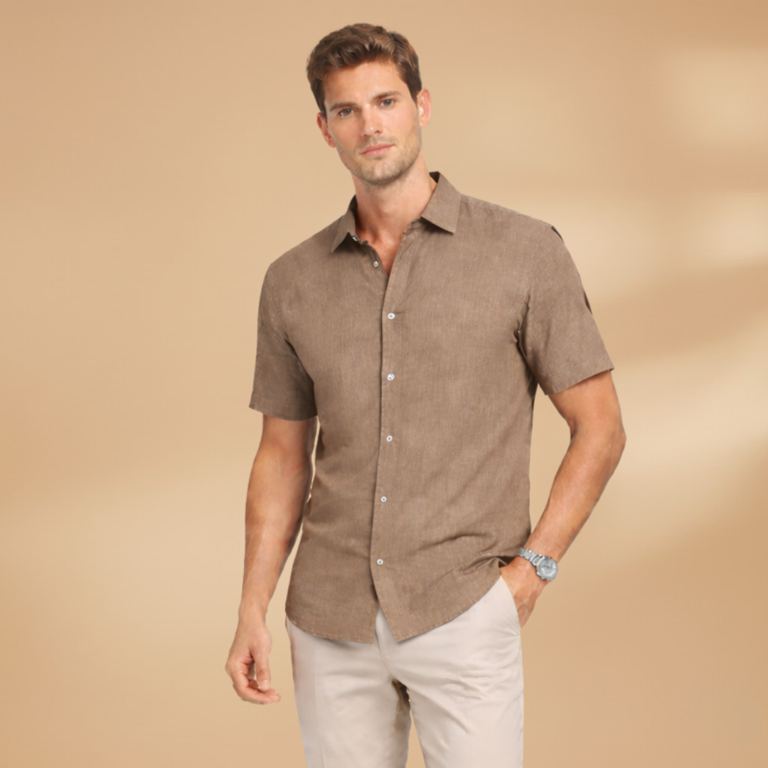 Classic men's short sleeve button-up shirt, a versatile top for warm weather & casual style.