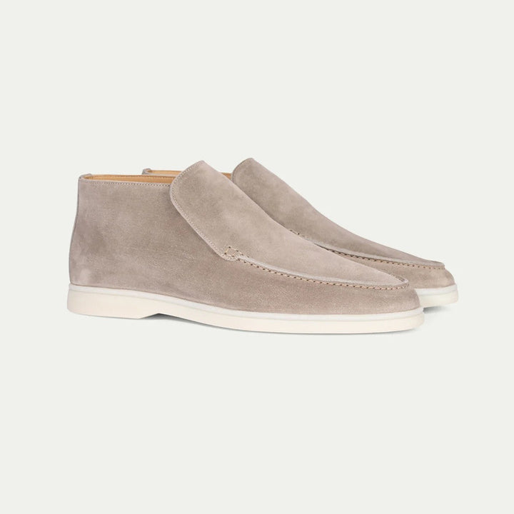 Effortless style with these men's classic slip-on casual loafers. Comfortable everyday footwear.