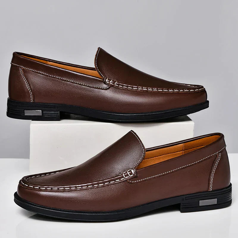 Men's comfortable brown loafers, classic slip-on design perfect for casual outings.