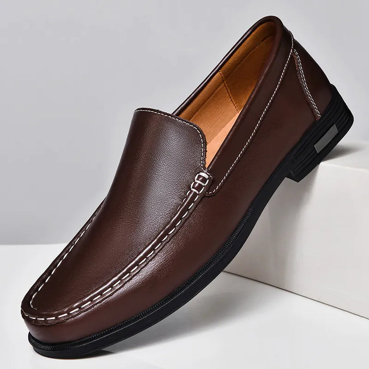 Durable men's classic slip-on loafers, offering style and comfort for daily wear footwear.