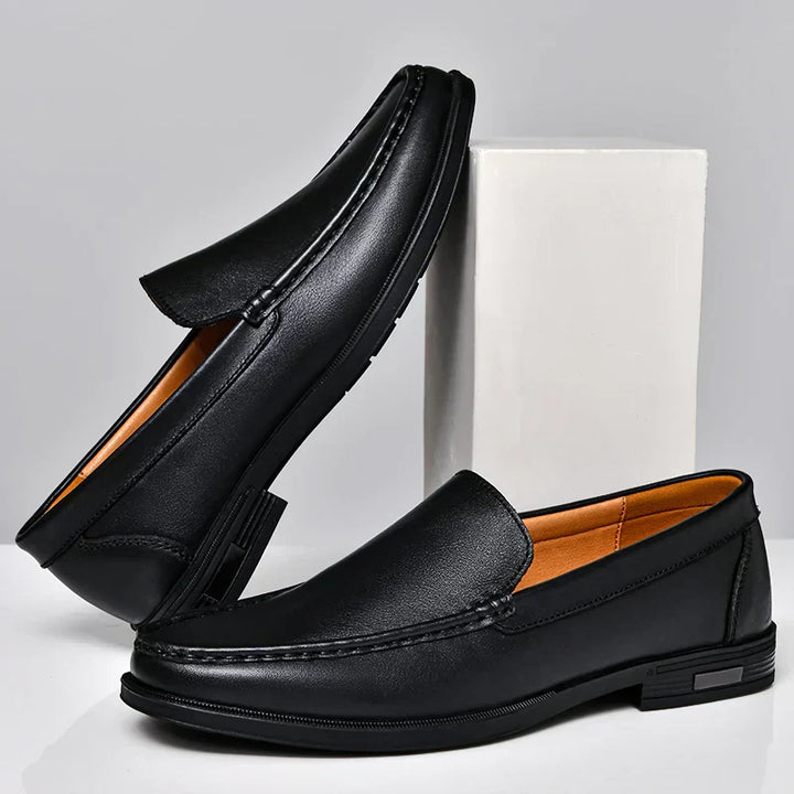 Brown men's slip-on loafers, versatile classic style for business casual & comfort.