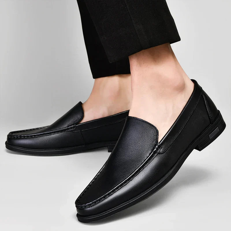 Premium brown men's classic loafers, comfortable slip-on footwear for all-day wear.