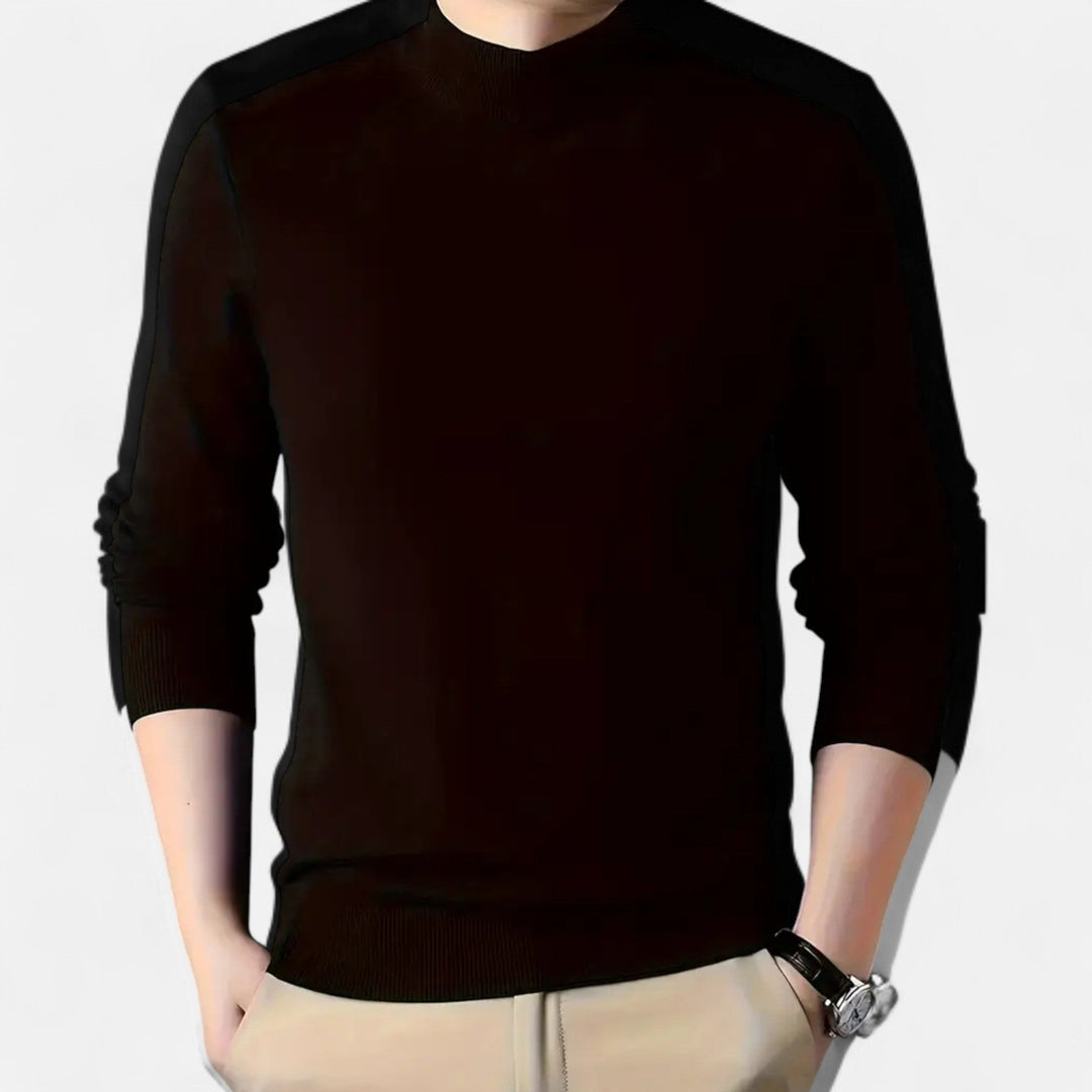 Man wearing a classic stand-collar knit sweater, a versatile long-sleeve pullover for winter.