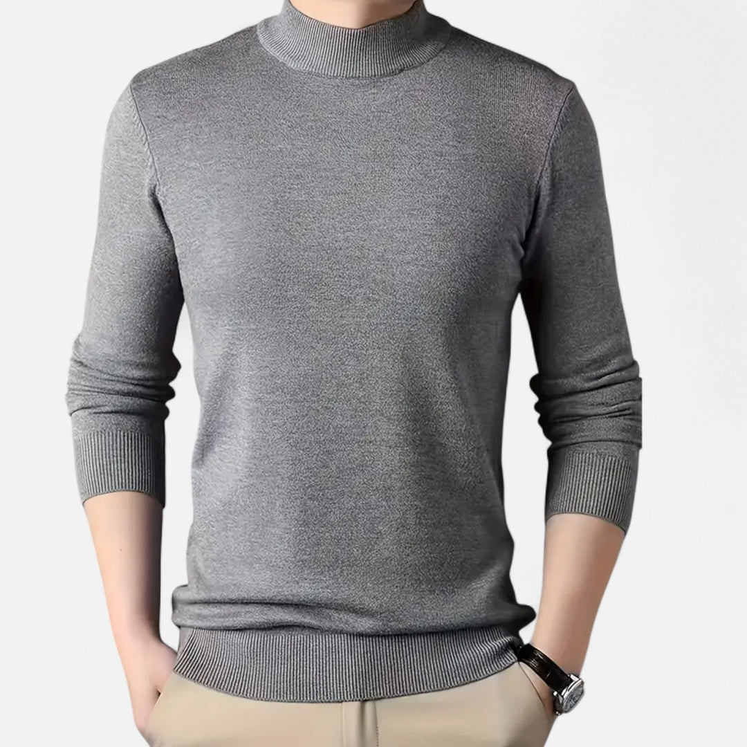 Close-up of a men's stand-collar knit sweater, showcasing the classic pullover design for winter.