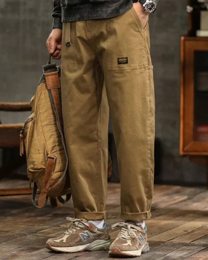 Black men's straight leg cargo pants. Relaxed fit provides comfort for everyday wear and versatile fashion.