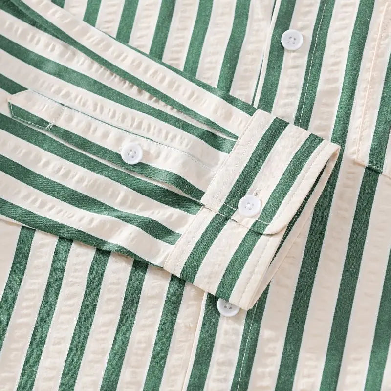 Full view of a man wearing a smart casual striped button-down shirt, great for everyday style.