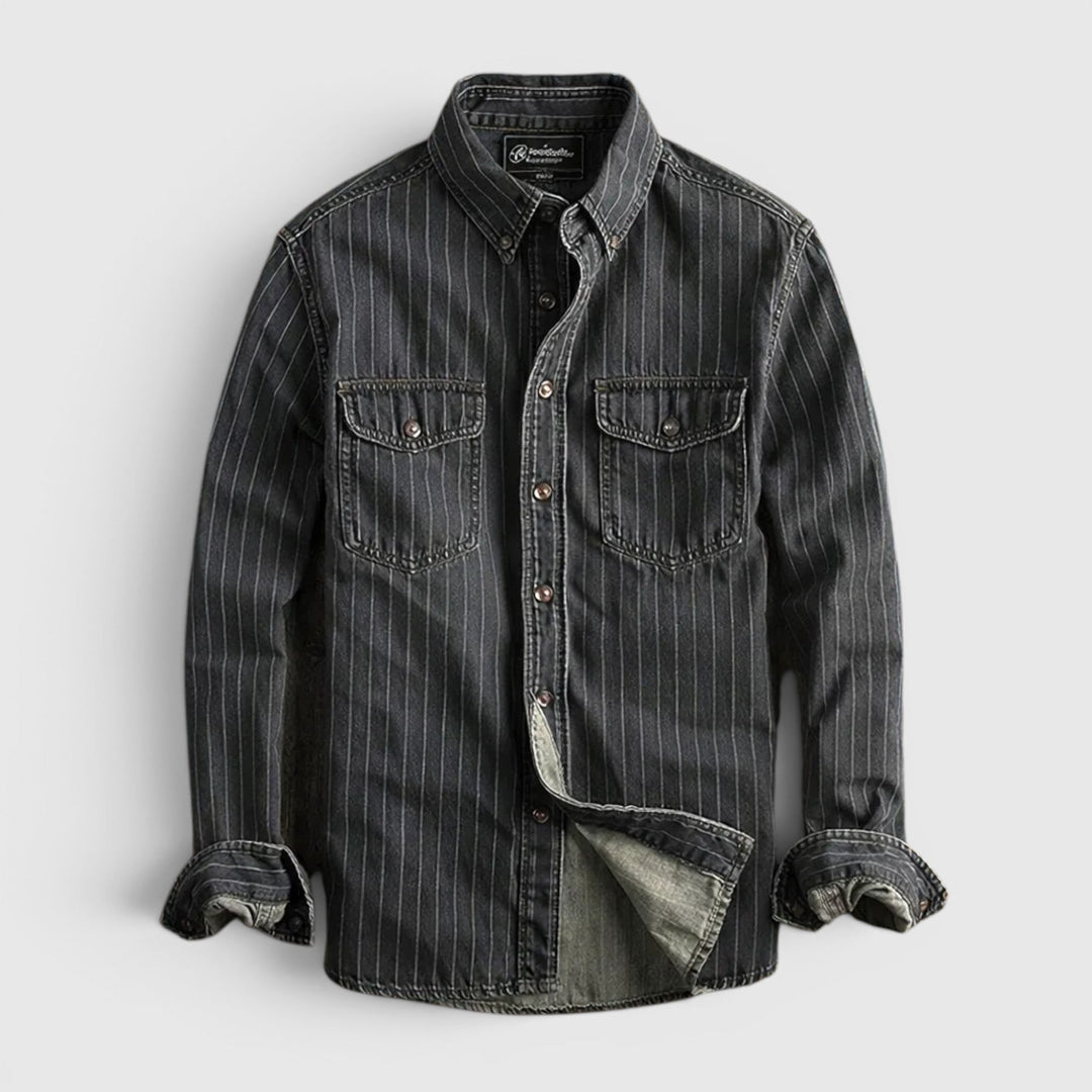 Model wearing a men's classic blue & black striped long sleeve button-up shirt, showcasing comfortable fit.