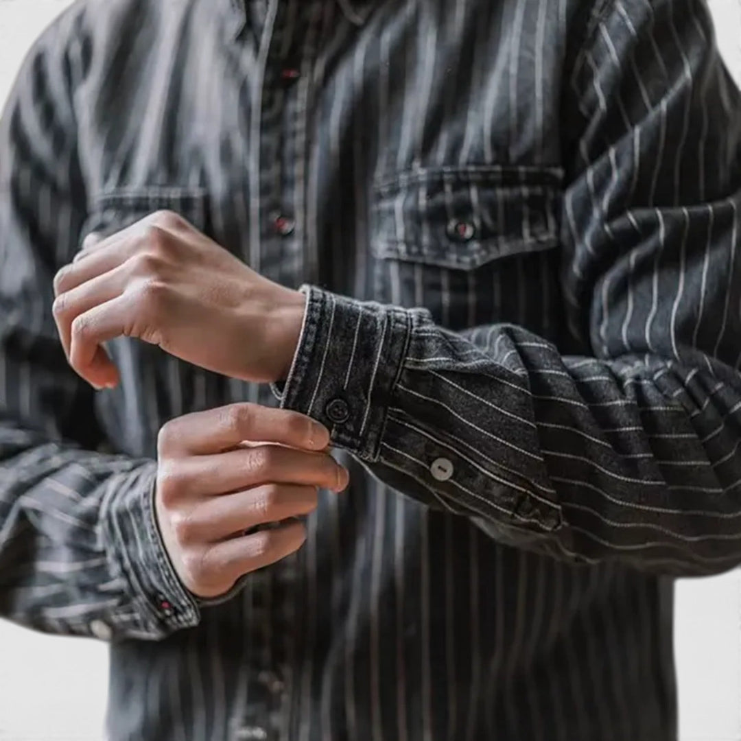 Men's long sleeve button-up shirt featuring classic blue and black stripes for timeless everyday fashion.