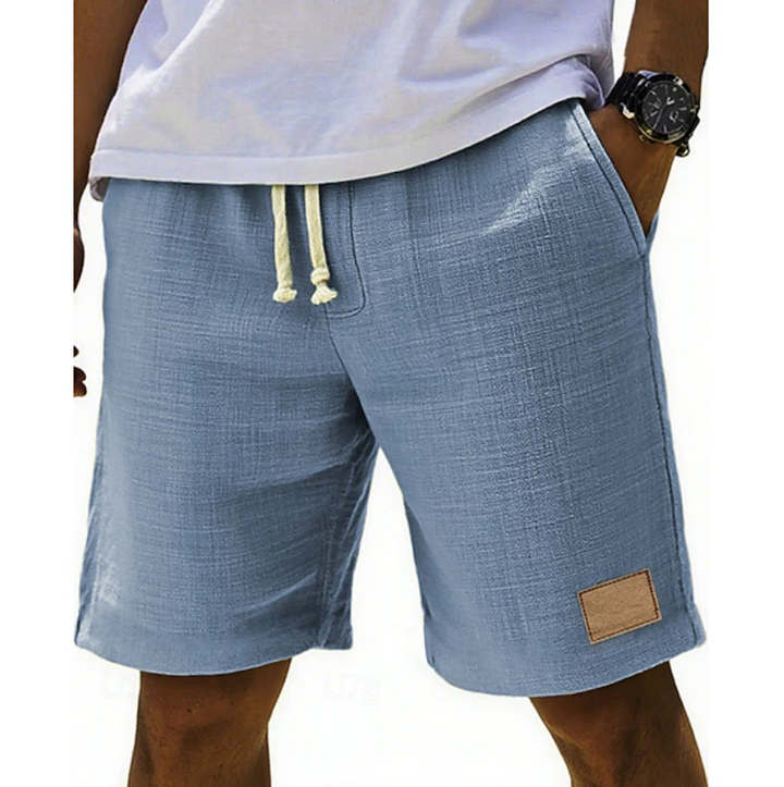 Relaxed fit men's summer shorts with delicate lace trim, ideal for warm weather and casual fashion.