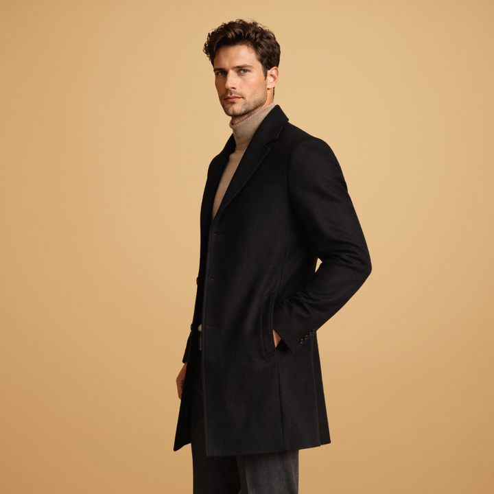 Detail shot of the wool blend fabric on a men's winter coat, offering superior warmth.