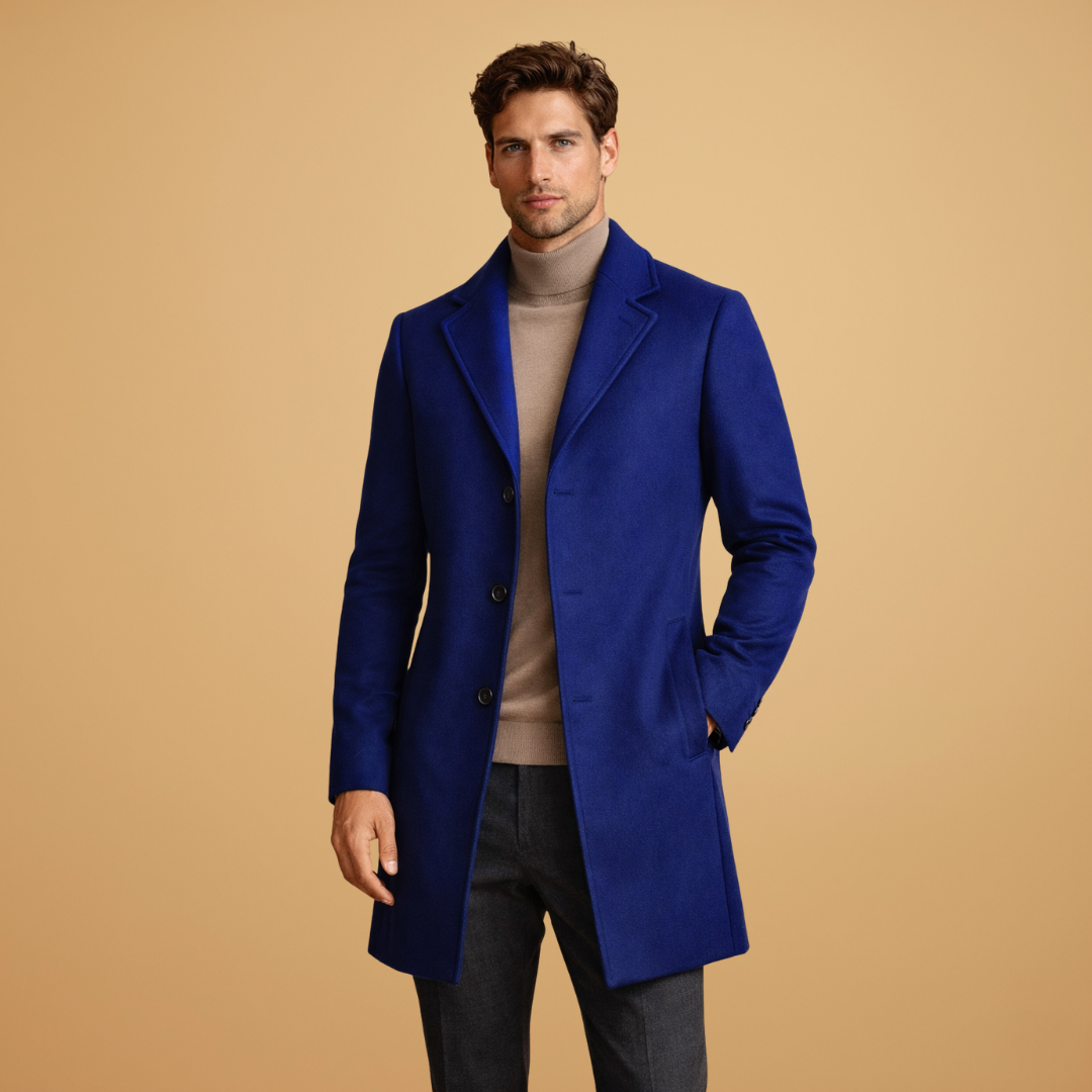 Man in a black classic overcoat, ideal for formal occasions and professional settings.