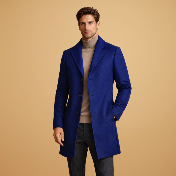 Man in a black classic overcoat, ideal for formal occasions and professional settings.
