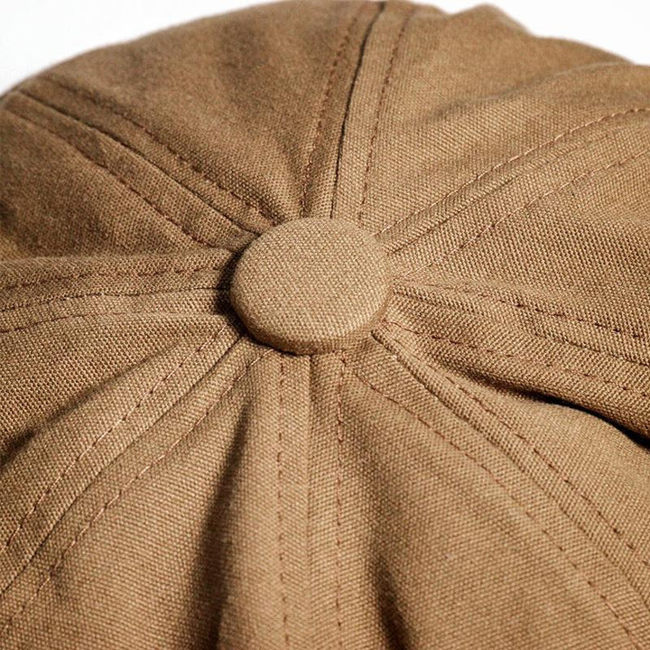 Classic men's flat cap. New vintage retro hat, British fashion style. Stylish driver cap for men's headwear.