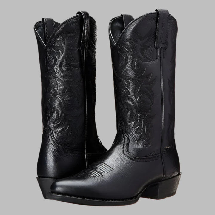 Stylish men's cowboy ankle boots, black leather, versatile for casual or dressy outfits, durable western footwear.