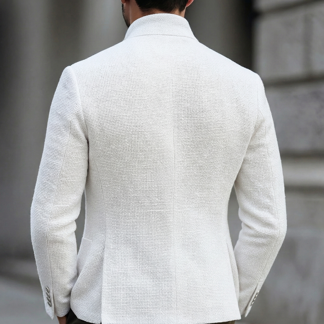 Stylish men's white blazer for modern fashion. Classic single-breasted design, tailored for a smart, versatile look.
