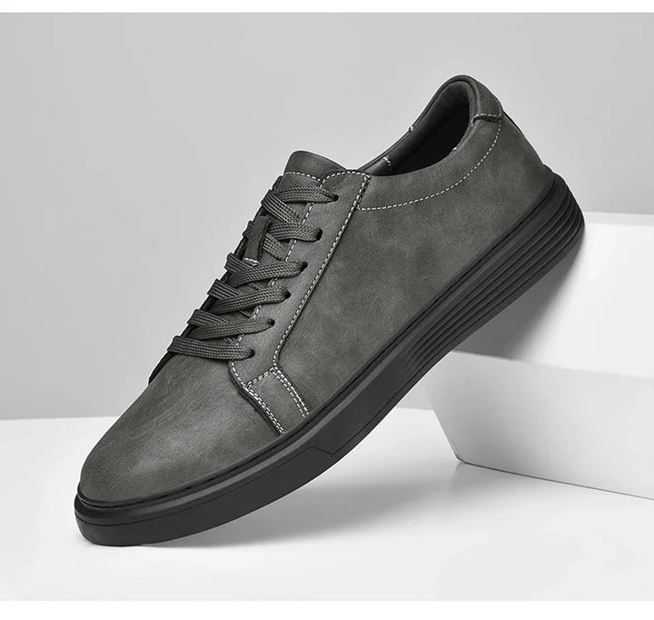 Durable sole of men's classic summer trainers, offering grip and comfort for versatile everyday wear.