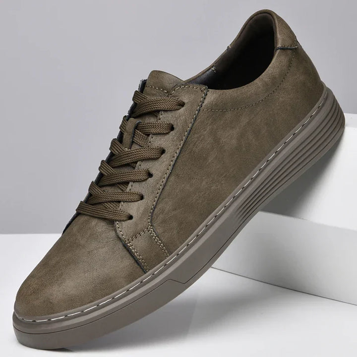 Textured material of men's summer trainers, classic design, comfortable and versatile for casual wear.