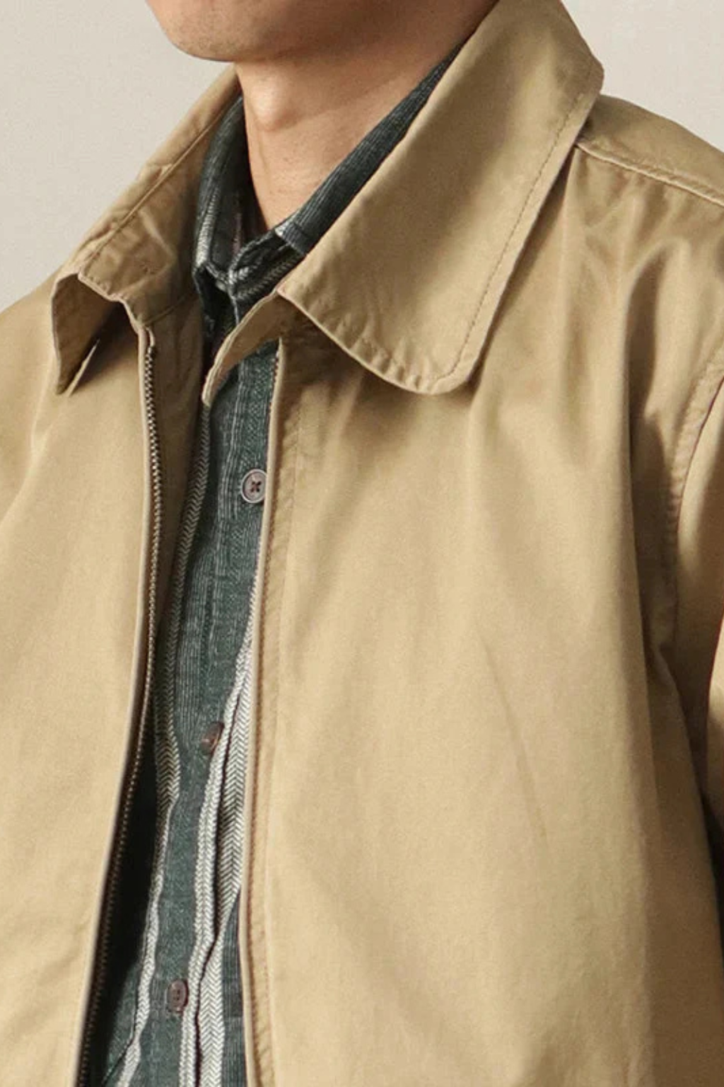 Stylish men's zip-up outerwear, ideal for spring and fall fashion.