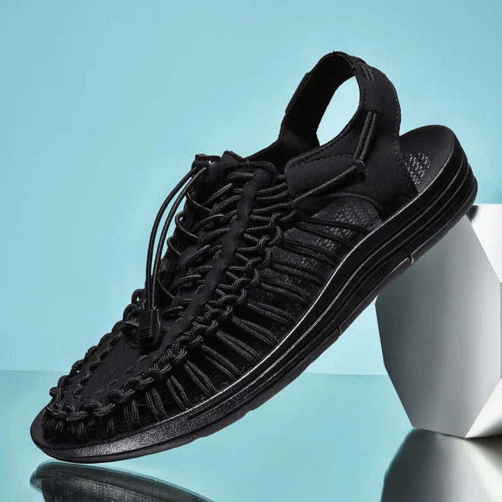 Athletic style men's closed toe walking sandals with adjustable laces, ideal for summer adventures.