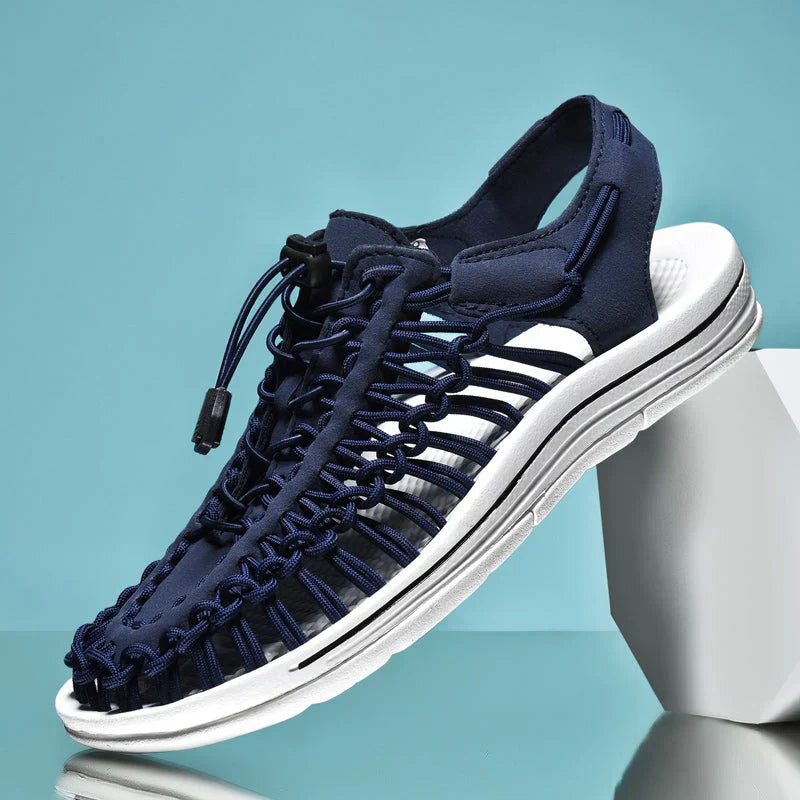 Protective men's closed toe lace-up sandals, designed for comfortable summer outdoor footwear.