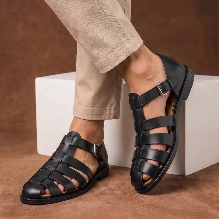 Stylish men's closed toe fisherman sandals with adjustable buckle strap, perfect casual summer footwear.