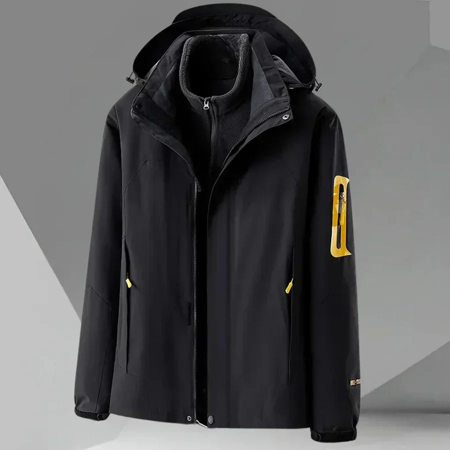 Man wearing a stylish color block hooded rain jacket, perfect for everyday casual spring/fall wear.