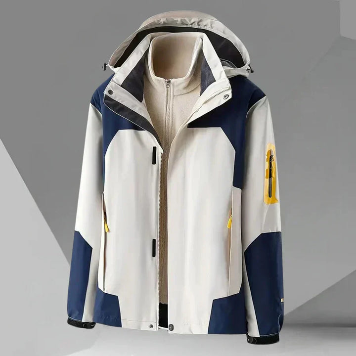 Lightweight men's hooded rain jacket with a vibrant color block design. Excellent outerwear for changing weather.