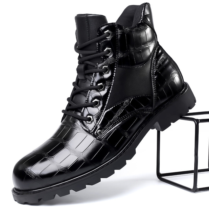 Close-up of men's alligator embossed combat boots, highlighting the intricate texture & craftsmanship.