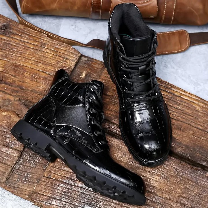 Fashion-forward men's ankle boots, black alligator embossed combat style with secure lace-up closure.