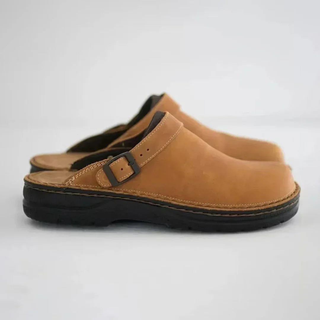 Men's comfort clogs with adjustable buckle strap, perfect for indoor & outdoor casual wear. Easy slip-on design.