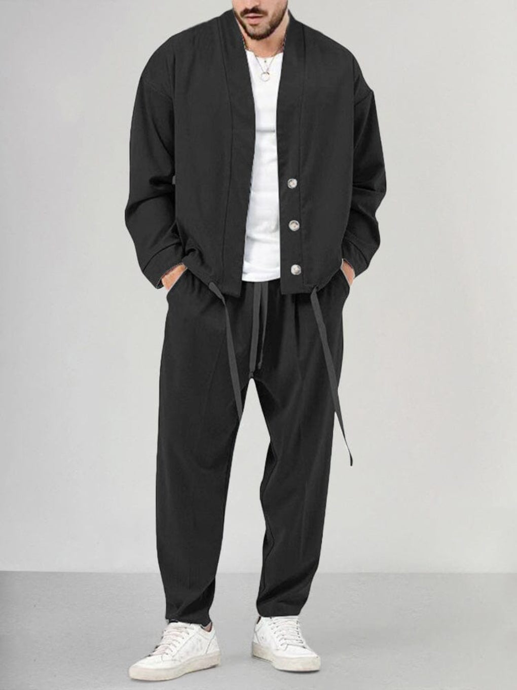 Stylish men's matching sweatsuit. This comfortable 2-piece set offers a relaxed fit for lounging or casual fashion.