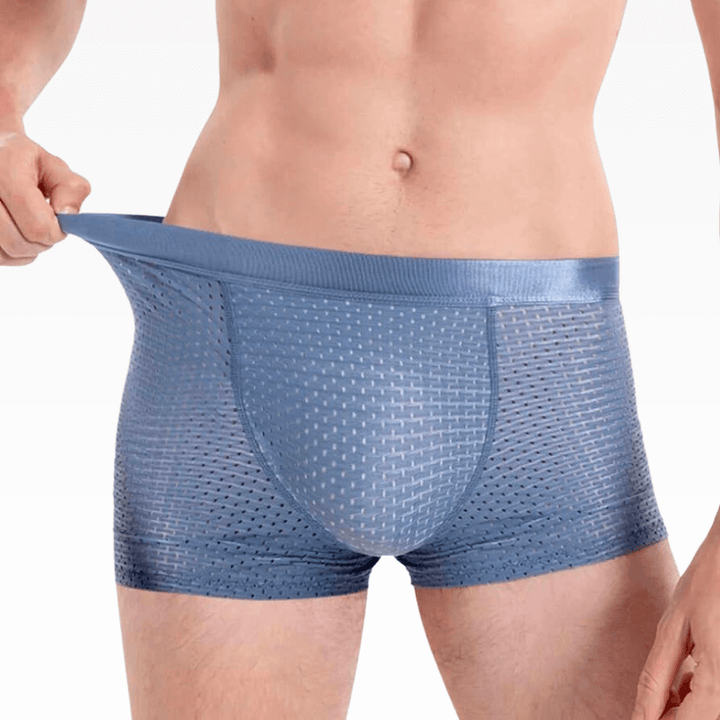 Multi-pack of men's ultimate comfort boxer shorts. Essential, breathable underwear for daily wear.