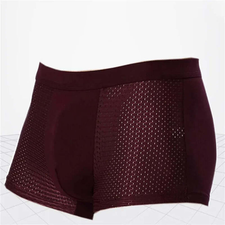 Display of various colors of men's boxer shorts, emphasizing comfort, breathability, & essential style.