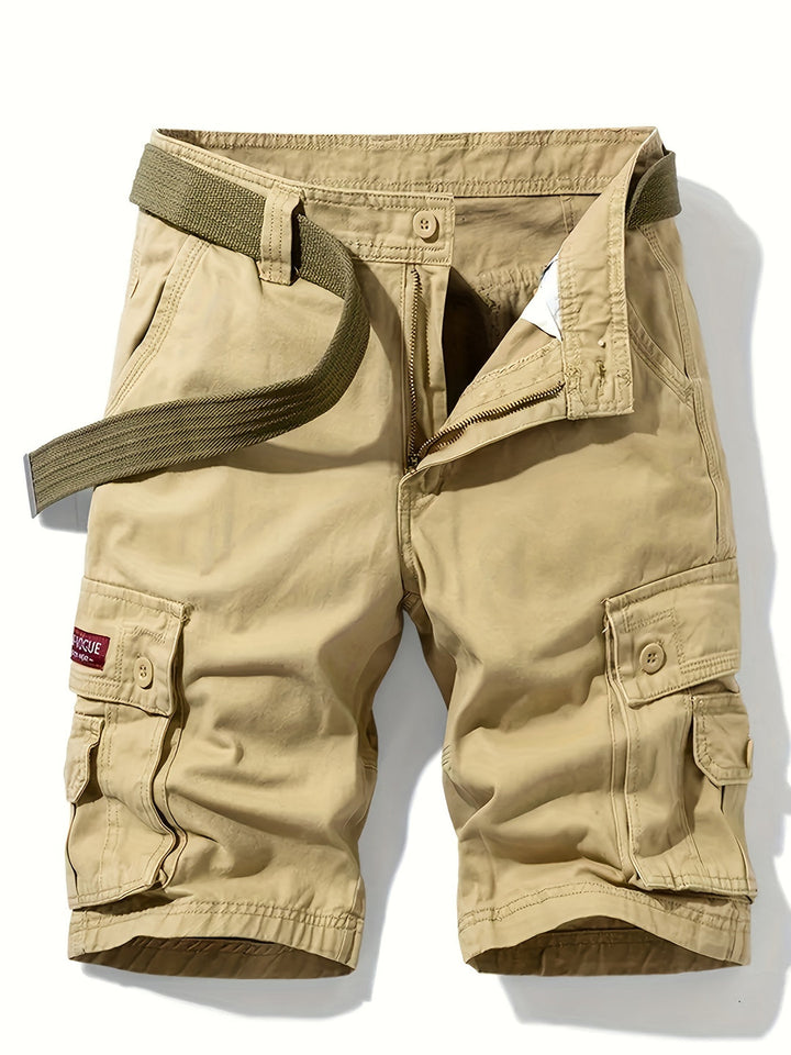 Stylish men's knee-length utility shorts, featuring spacious flap pockets and a comfortable mid-rise fit.