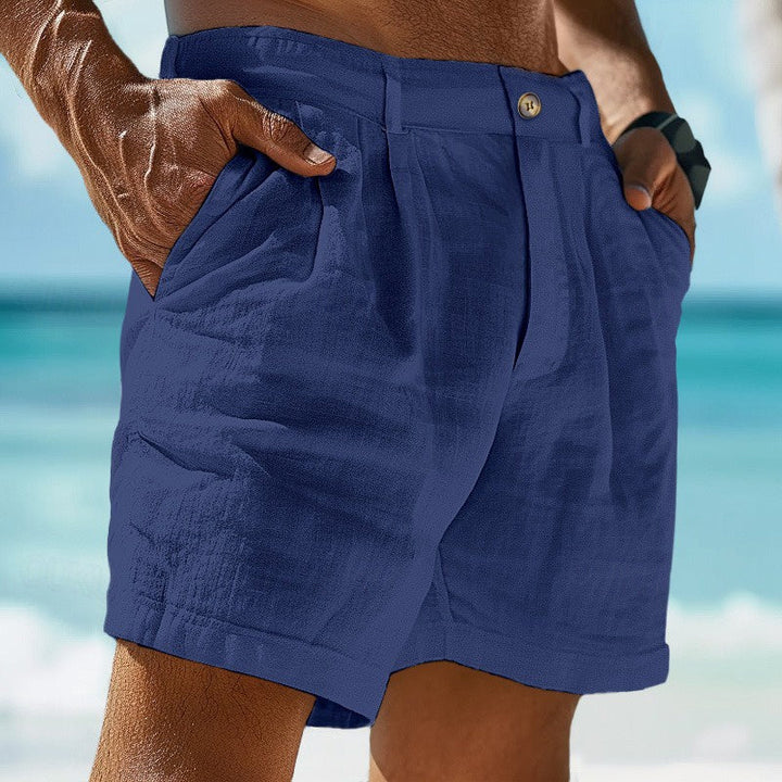 Man wearing lightweight relaxed fit chino shorts, perfect for casual summer outfits.