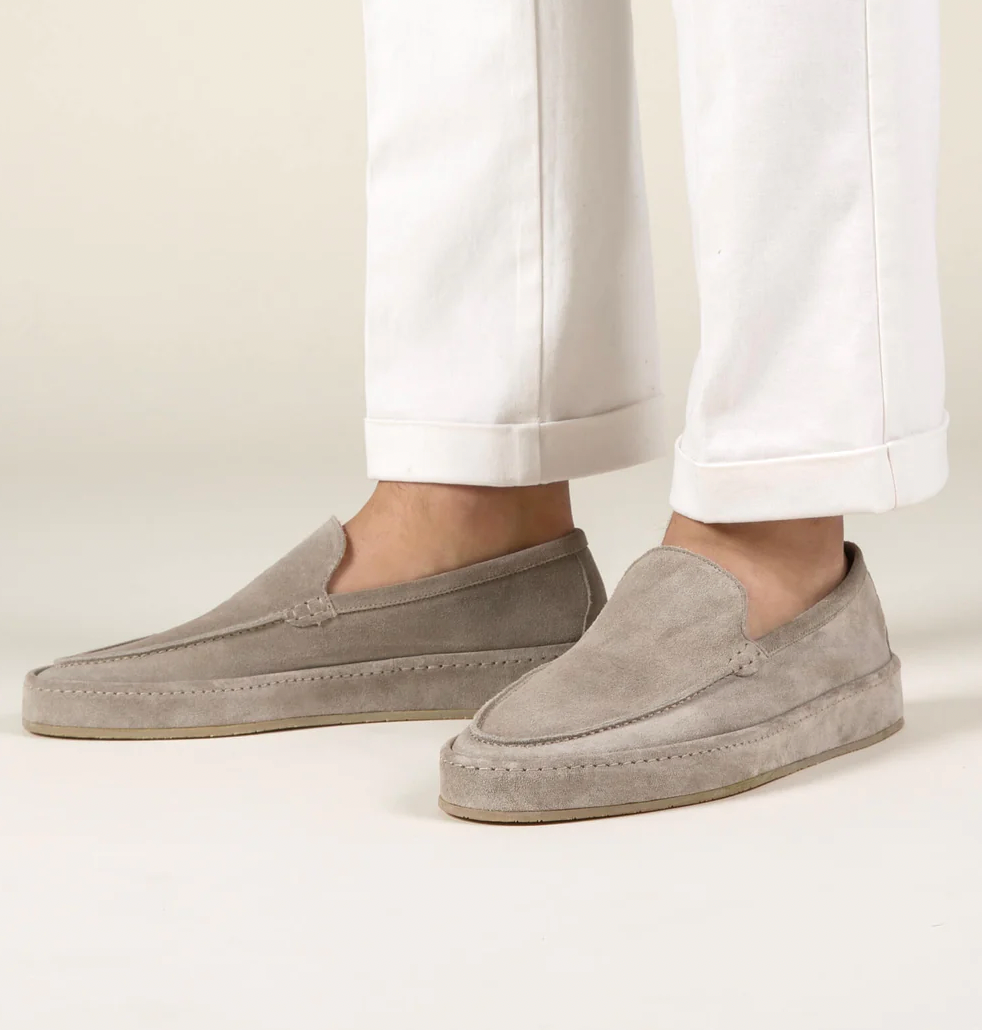 Men's comfortable slip-on loafers in classic black leather for smart casual wear.