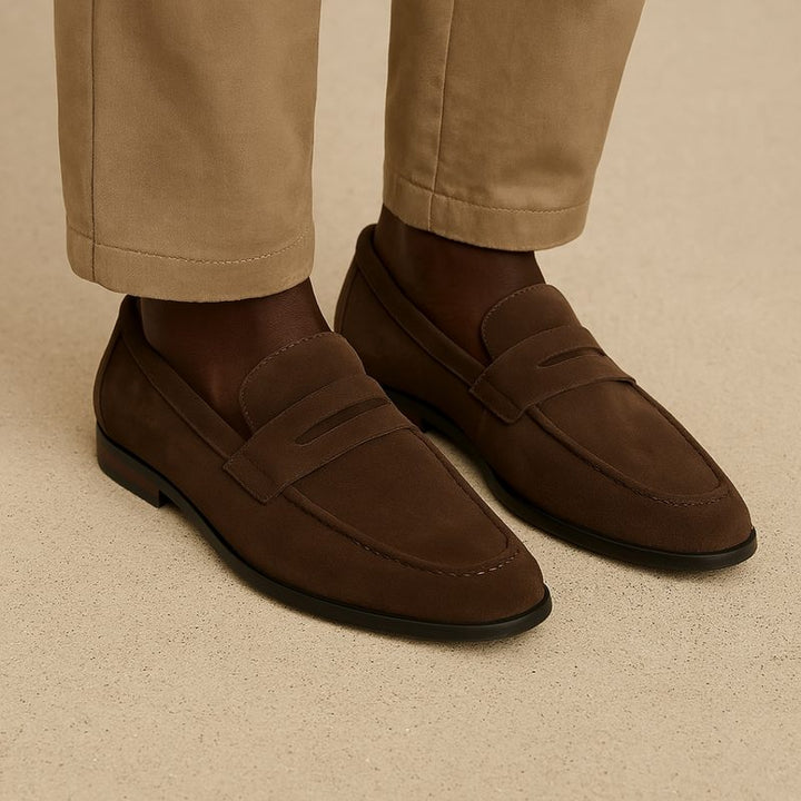 Sleek men's slip-on loafers with a flat heel design. Comfortable & stylish men's casual shoes for versatile fashion.