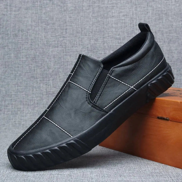 Stylish men's slip-on loafers, incredibly comfortable with distinctive contrast stitching for casual footwear.