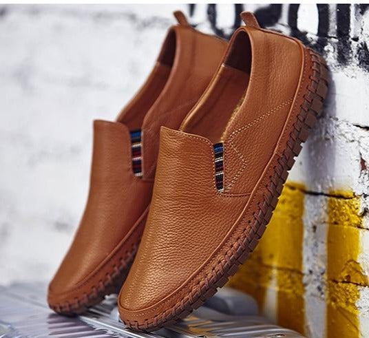 Modern men's slip-on shoes, providing ultimate comfort and flexibility for daily walking and easy wear.