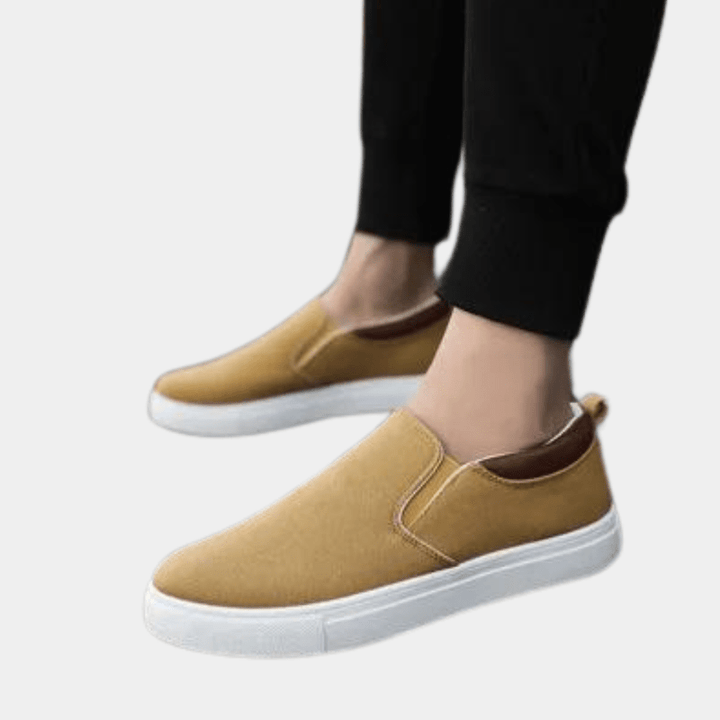 Stylish men's casual slip-on sneakers for effortless daily wear, offering comfort & a modern look.
