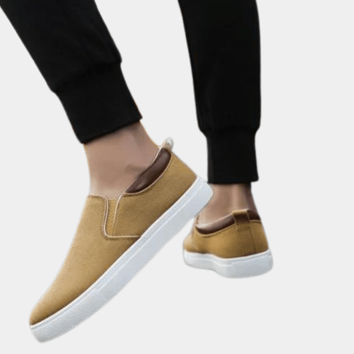 Men's summer slip-on sneakers, ideal for warm weather, offering breathability and flexible all-day comfort.