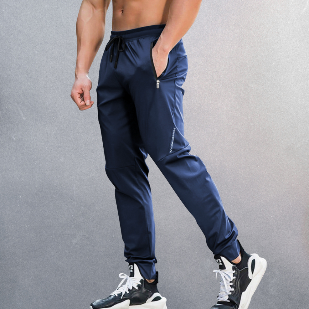 Stylish men's sport performance pants. Elastic waist provides comfort for workouts, travel & casual spring fashion.