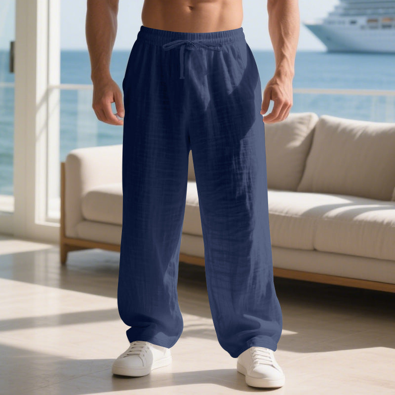 Men's relaxed fit straight leg pants, perfect for leisure. Comfortable everyday style with pockets.