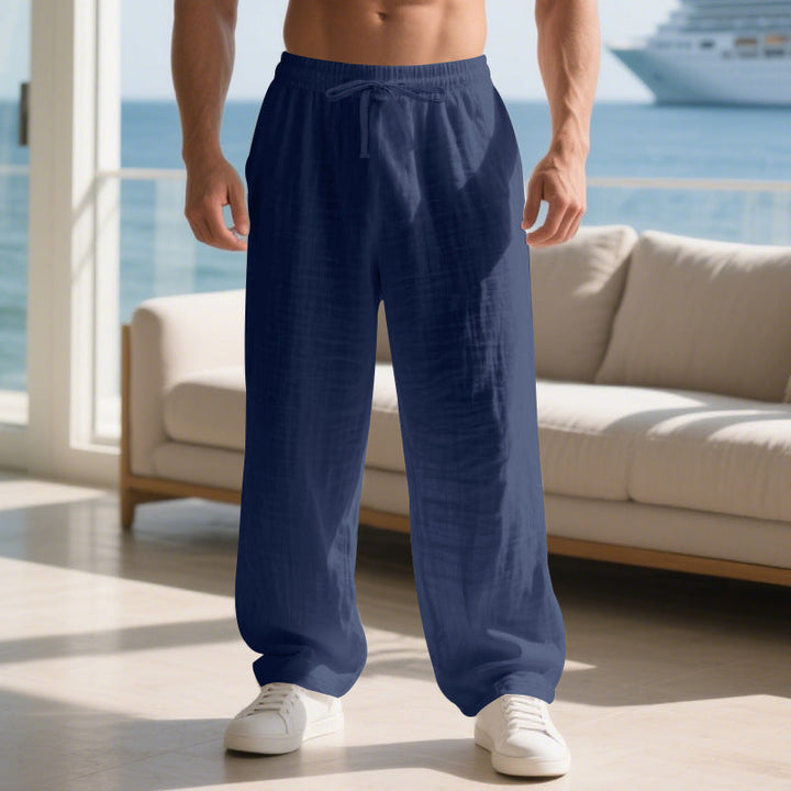 Men's relaxed fit straight leg pants, perfect for leisure. Comfortable everyday style with pockets.
