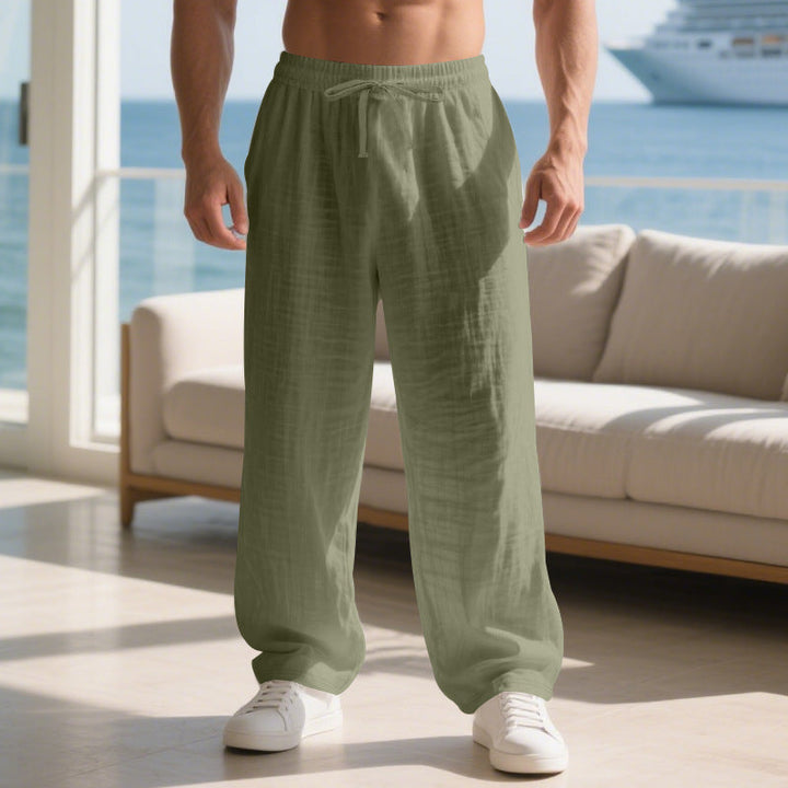 Men's straight leg casual trousers with drawstring waist & pockets, offering ultimate everyday comfort.