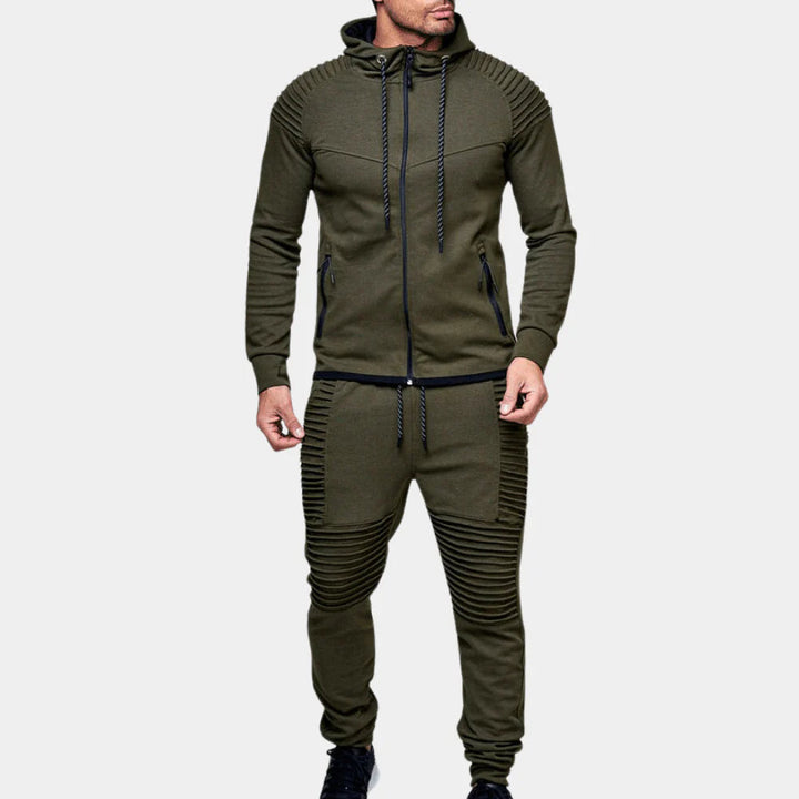 Men's activewear tracksuit set, designed for comfort & movement. Features a crewneck top & joggers for sports or leisure.