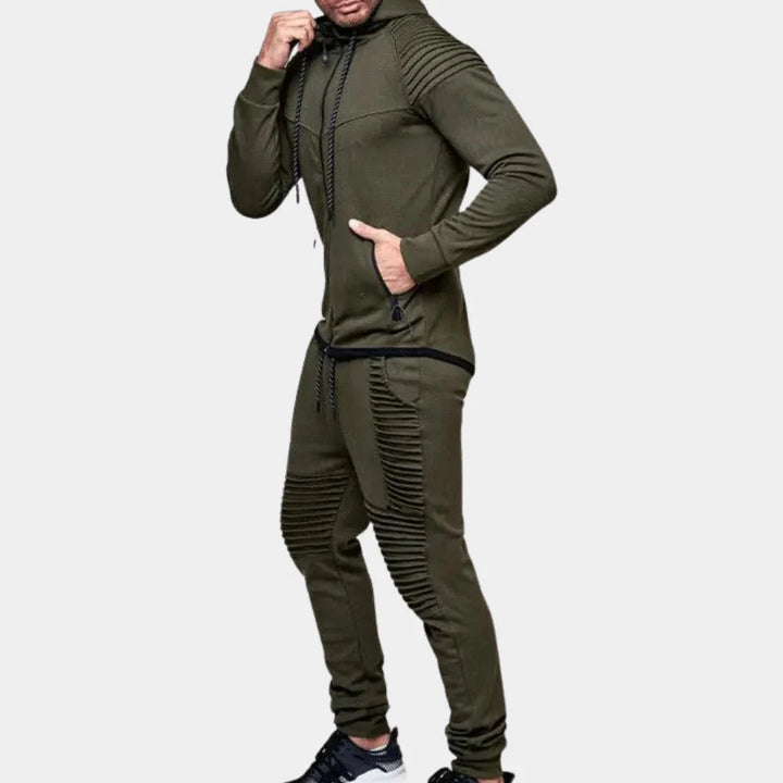 Modern men's style tracksuit with functional details, offering a comfortable crewneck top and joggers for versatile wear.