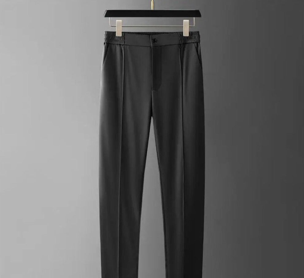 Soft, comfortable men's two-piece set featuring a short-sleeve polo and tailored tapered pants.
