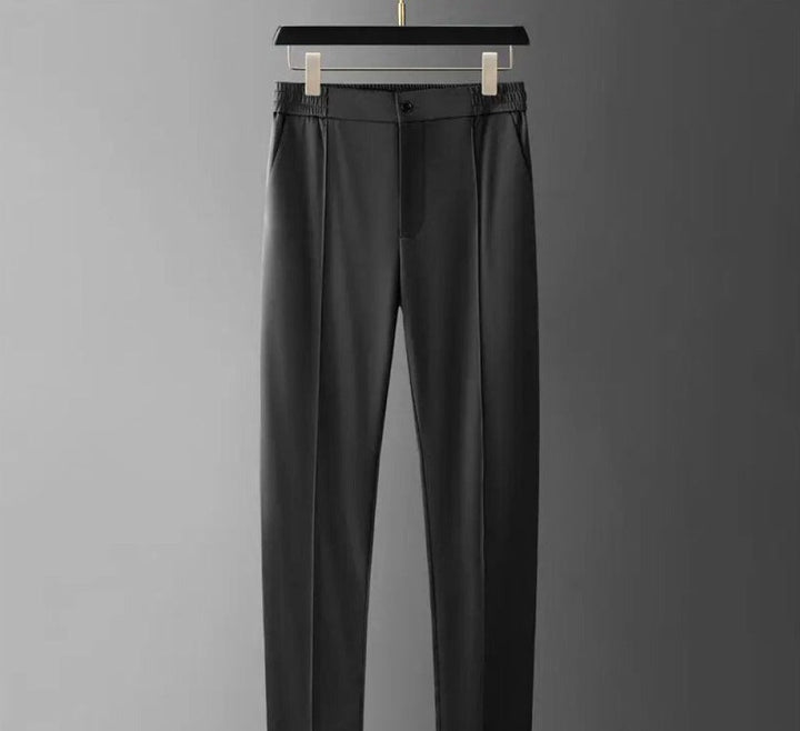 Soft, comfortable men's two-piece set featuring a short-sleeve polo and tailored tapered pants.