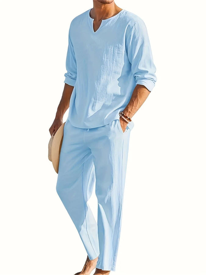 Men's V-neck long-sleeve top & relaxed trousers. Comfortable two-piece casual outfit set.